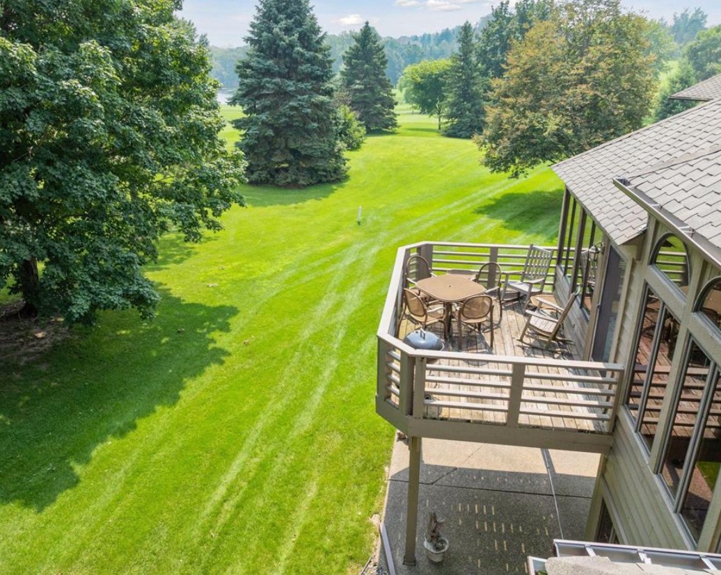Deck and panoramic golf course view at 3773 Village Court